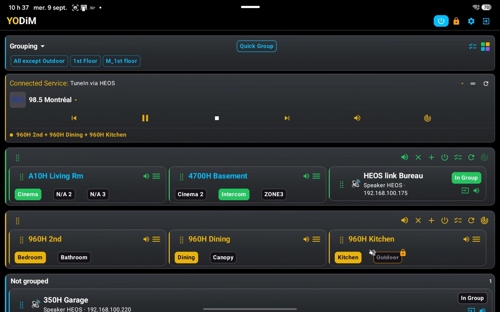 The YODiM home screen on a tablet, in grouping mode: two HEOS groups formed, the playing service, and the speakers left out of any group